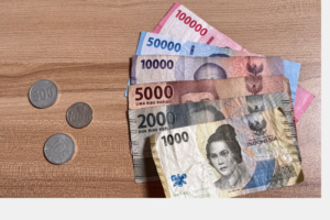ilustrasi rupiah melemah